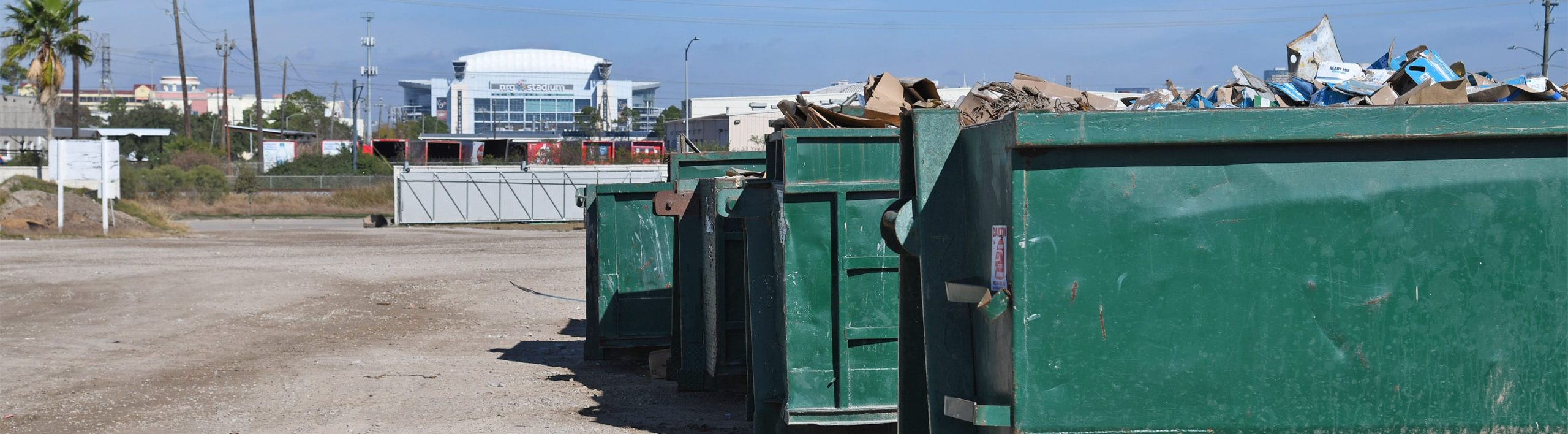 Actual DW Companies roll-off dumpsters in Houston
